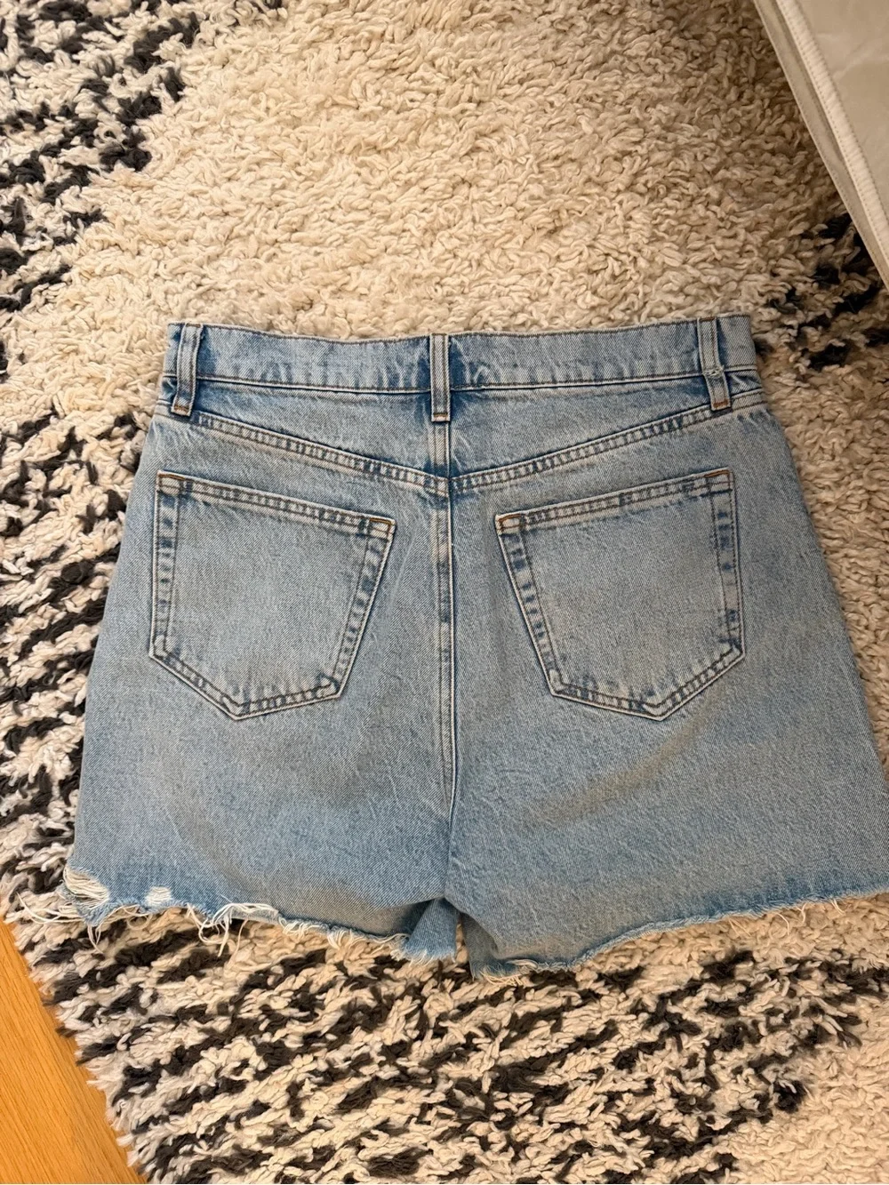 FRAME Denim The Easy Cutoff Shorts in Swindle